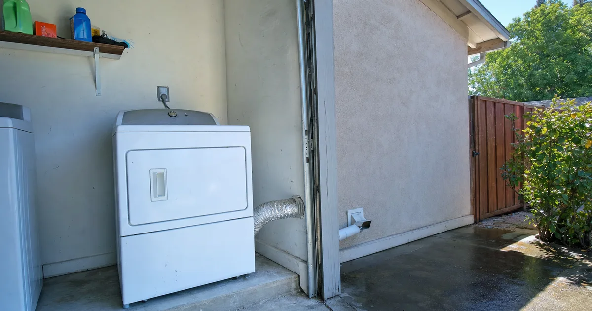 A Home Dryer Pulled Out From The Wall in Cardiff, CA